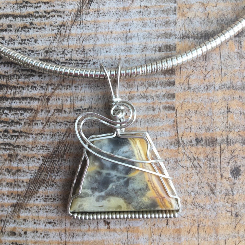 Silver slide with a beautiful stone necklace